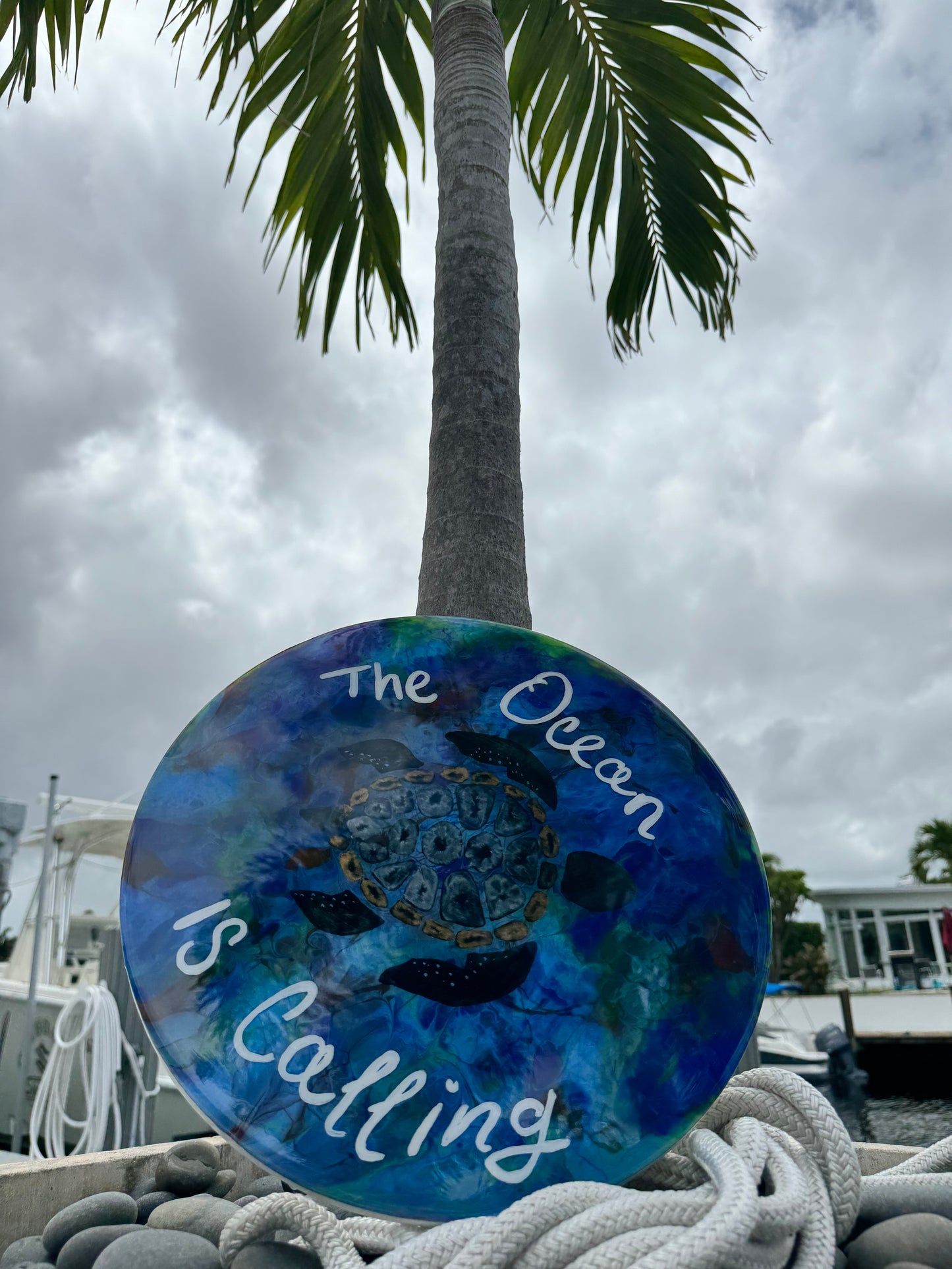 Home sign “the ocean is calling” 14 in.